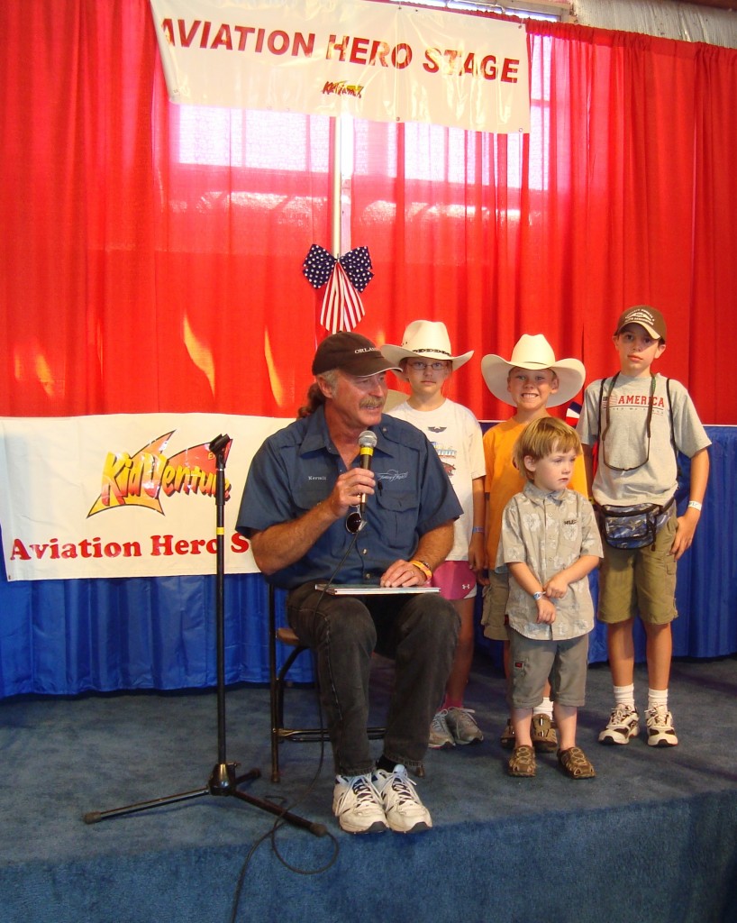 Handing out three Gee Bee Books after reading to the crowd!