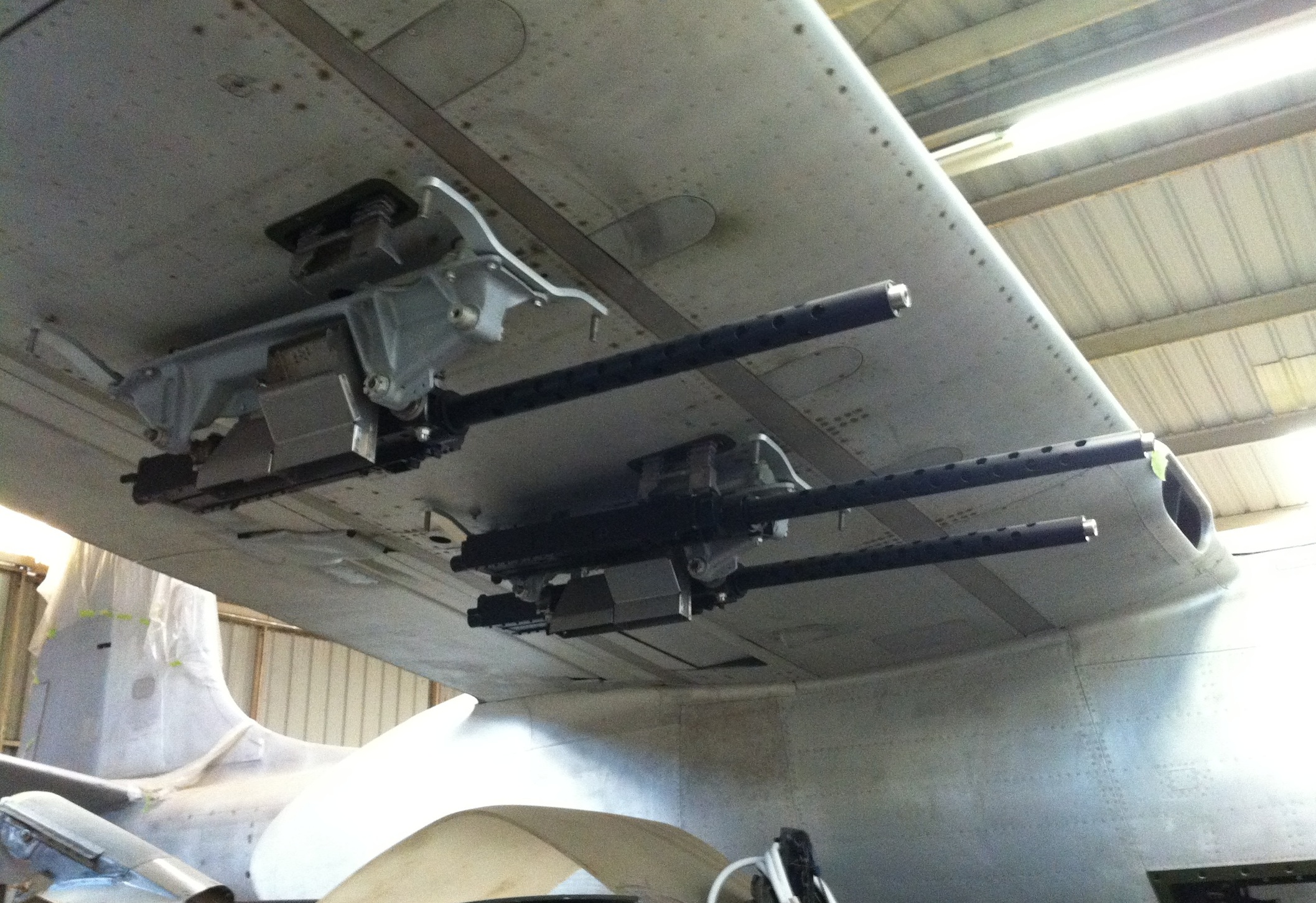 Three of the four guns mounted per side that are housed in streamlined pods