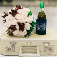 Bridal Bouquet with Vintage Suitcase and Beer by Raniamarietphoto.com