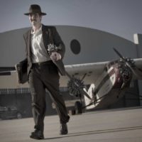 Themed Photography Session with Walt Disney Character In Front of Vintage Airplane