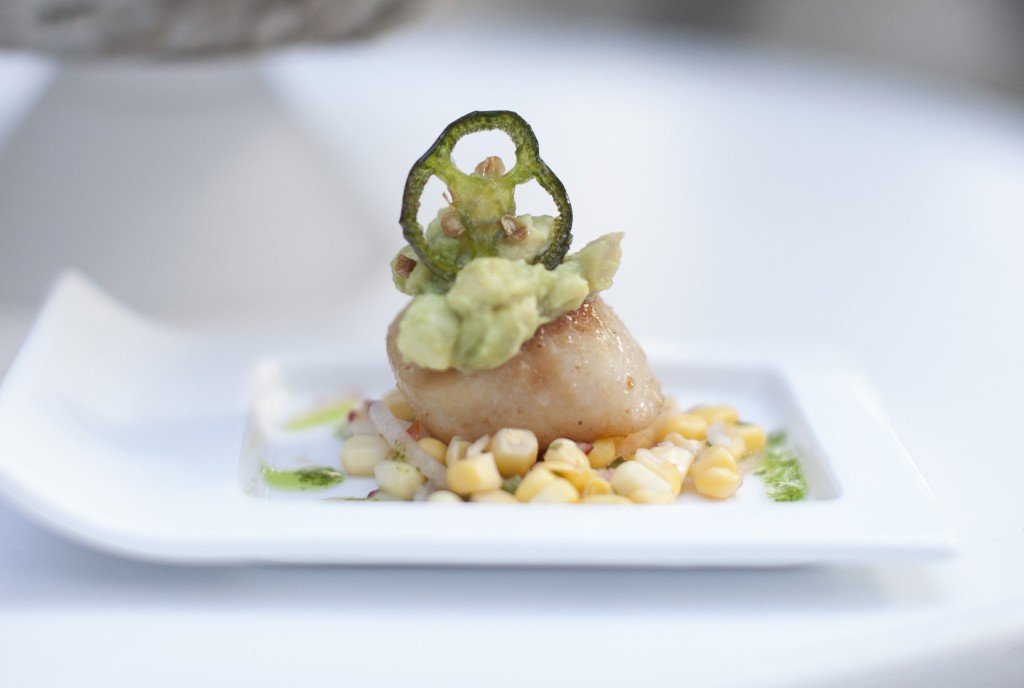 Seared scallop with jalapeno on corn relish