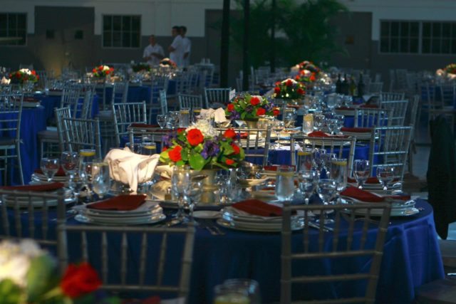 Round Table Seating for 10 with pin spots on centerpieces