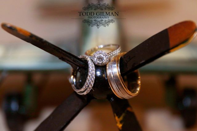 Wedding Rings Displayed on Model Plane Prop